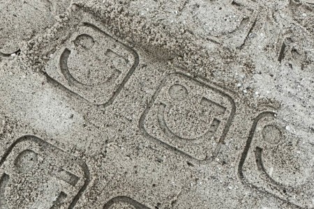 Smiley is het zand met een zandstempel