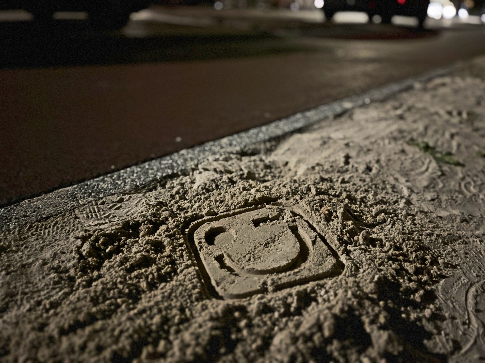 Smiley in het zand Groningen6